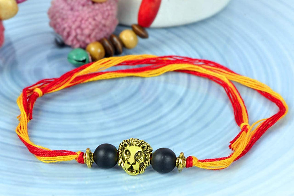 STRIPES Multi Colour Thread Evil Eye Protection With Golden Lion Head Rakhi For Brother